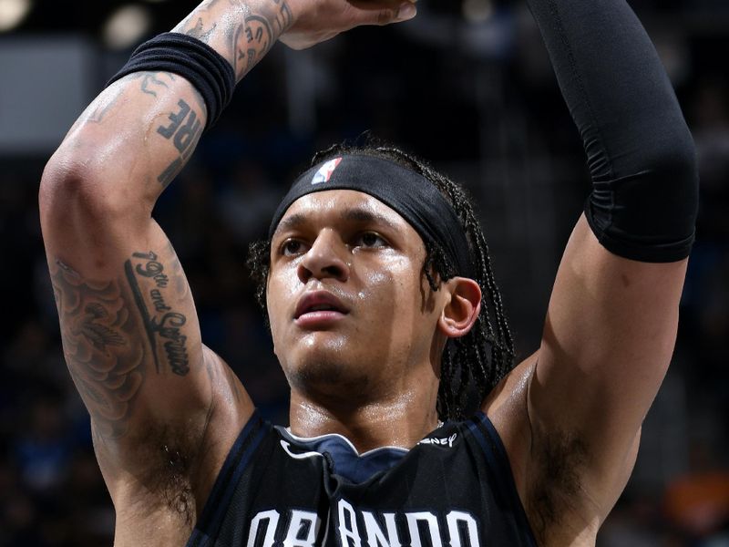 ORLANDO, FL - JANUARY 4: Paolo Banchero #5 of the Orlando Magic shoots a free throw against the Oklahoma City Thunder on January 4, 2023 at Amway Center in Orlando, Florida. NOTE TO USER: User expressly acknowledges and agrees that, by downloading and or using this photograph, User is consenting to the terms and conditions of the Getty Images License Agreement. Mandatory Copyright Notice: Copyright 2023 NBAE (Photo by Fernando Medina/NBAE via Getty Images)