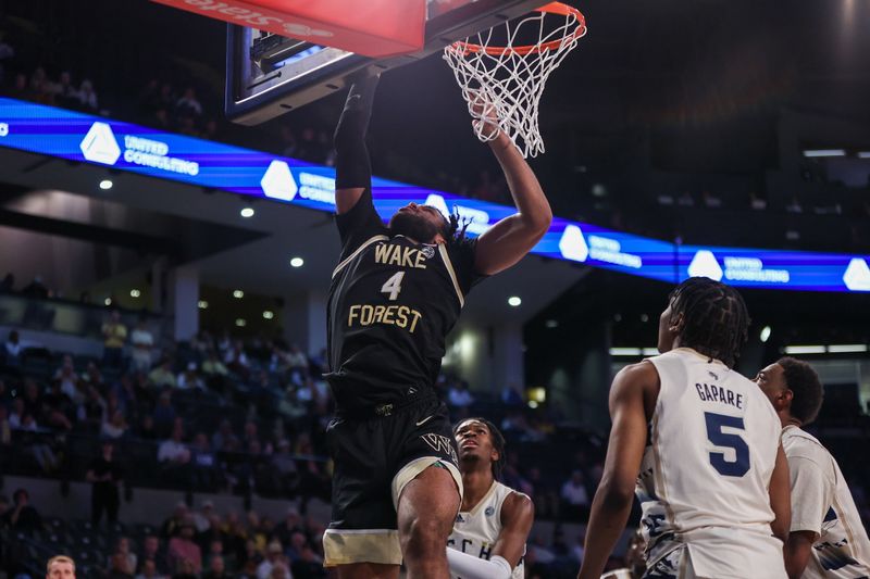 Feb 6, 2024; Atlanta, Georgia, USA; Wake Forest Demon Deacons forward Efton Reid III (4) shoots against the Georgia Tech Yellow Jackets in the first half at McCamish Pavilion. Mandatory Credit: Brett Davis-USA TODAY Sports