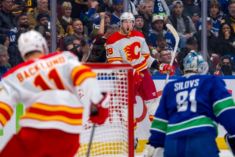 Oct 9, 2024; Vancouver, British Columbia, CAN; Calgary Flames forward Anthony Mantha (39) celebrates his goal against the Vancouver Canucks during the first period at Rogers Arena. Mandatory Credit: Bob Frid-Imagn Images