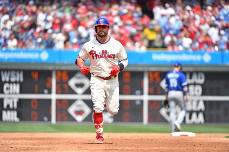 Aug 6, 2023; Philadelphia, Pennsylvania, USA; Philadelphia Phillies left fielder Kyle Schwarber (12) runs the bases after hitting a home run against the Kansas City Royals during the second inning at Citizens Bank Park. Mandatory Credit: Eric Hartline-USA TODAY Sports