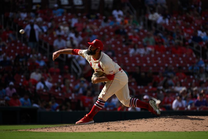 Jun 8, 2024; St. Louis, Missouri, USA; St. Louis Cardinals pitcher Andrew Kittredge (27) throws against the Colorado Rockies during the seventh inning at Busch Stadium. Mandatory Credit: Jeff Le-USA TODAY Sports