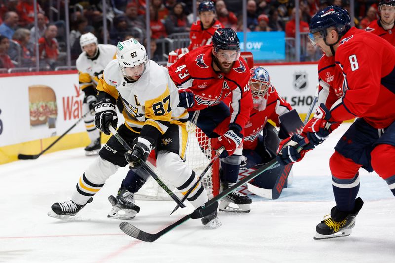 Apr 4, 2024; Washington, District of Columbia, USA; Pittsburgh Penguins center Sidney Crosby (87) battles Washington Capitals right wing Tom Wilson (43) and Capitals left wing Alex Ovechkin (8) next to Capitals goaltender Charlie Lindgren (79) in the second period at Capital One Arena. Mandatory Credit: Geoff Burke-USA TODAY Sports