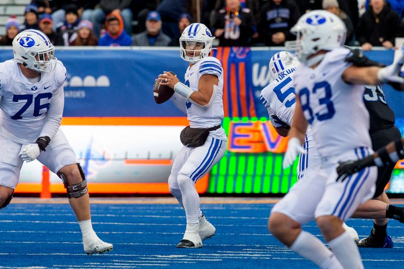 Nov 5, 2022; Boise, Idaho, USA; Brigham Young Cougars quarterback Jaren Hall (3) drops back to pass against the Boise State Broncos during the first half at Albertsons Stadium. Mandatory Credit: Brian Losness-USA TODAY Sports