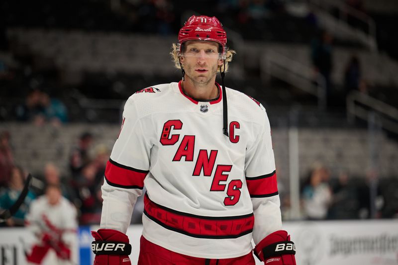 Oct 17, 2023; San Jose, California, USA; Carolina Hurricanes center Jordan Staal (11) skates on the ice during warmups before the game between the San Jose Sharks and the Carolina Hurricanes at SAP Center at San Jose. Mandatory Credit: Robert Edwards-USA TODAY Sports