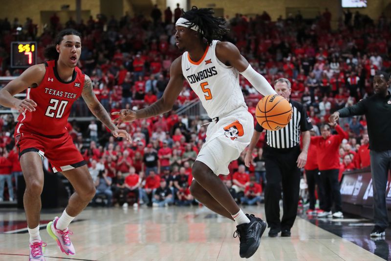 Mar 4, 2023; Lubbock, Texas, USA;  Oklahoma State Cowboys guard Caleb Asberry (5) dribbles the ball against Texas Tech Red Raiders guard Jaylon Tyson (20) in the second half at United Supermarkets Arena. Mandatory Credit: Michael C. Johnson-USA TODAY Sports