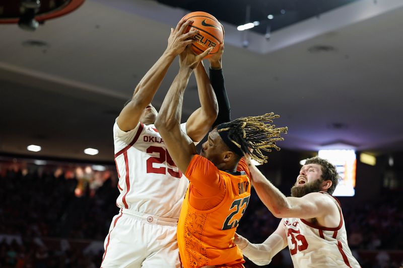 Feb 1, 2023; Norman, Oklahoma, USA; Oklahoma State Cowboys forward Tyreek Smith (23) and Oklahoma Sooners guard Grant Sherfield (25) fight for a loose ball during the first half at Lloyd Noble Center. Mandatory Credit: Alonzo Adams-USA TODAY Sports