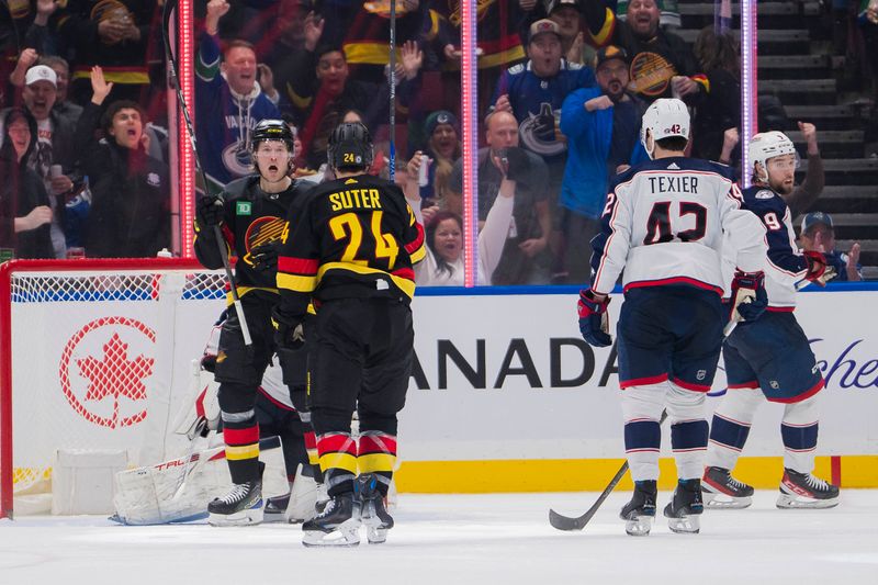 Jan 27, 2024; Vancouver, British Columbia, CAN; Columbus Blue Jackets forward Alexandre Texier (42) and goalie Elvis Merzlikins (90) and defenseman Ivan Provorov (9) watch as Vancouver Canucks forward Brock Boeser (6) and forward Pius Suter (24) celebrate Boeser s second goal of the game in the third period at Rogers Arena. Canucks won 5-4 in overtime. Mandatory Credit: Bob Frid-USA TODAY Sports