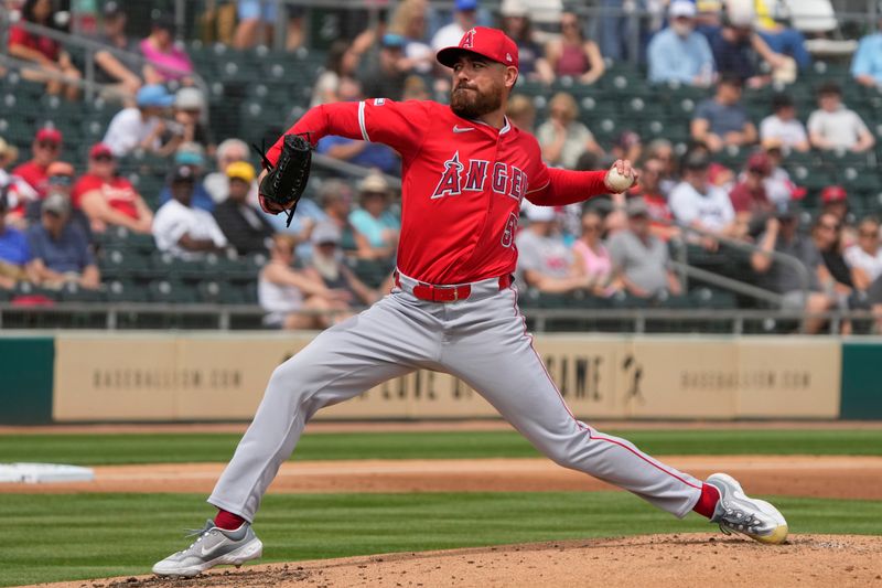 Mar 23, 2024; Mesa, Arizona, USA; Los Angeles Angels relief pitcher Matt Moore (55) throws against the Oakland Athletics in the first inning at Hohokam Stadium. Mandatory Credit: Rick Scuteri-USA TODAY Sports