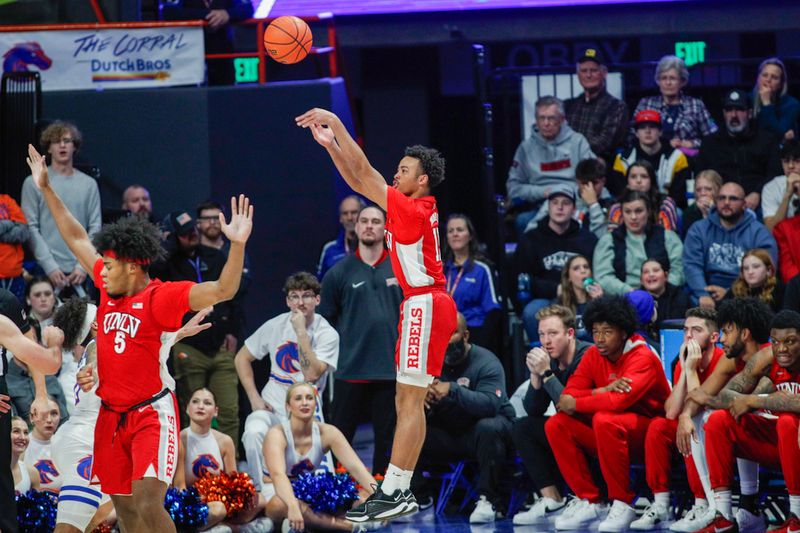 Jan 16, 2024; Boise, Idaho, USA; UNLV Rebels guard Dedan Thomas Jr. (11) during the second half against the Boise State Broncos at ExtraMile Arena. UNLV beats Boise State 68-64. Mandatory Credit: Brian Losness-USA TODAY Sports