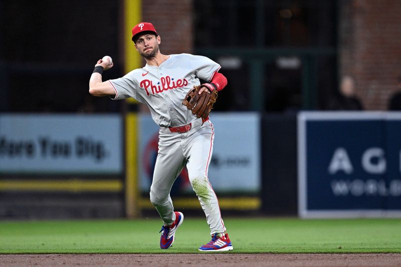 Apr 26, 2024; San Diego, California, USA; Philadelphia Phillies shortstop Trea Turner (7) throws to first base on a ground out by San Diego Padres third baseman Manny Machado (not pictured) during the third inning at Petco Park. Mandatory Credit: Orlando Ramirez-USA TODAY Sports