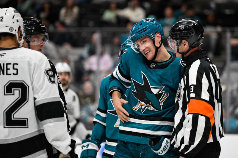 Oct 29, 2024; San Jose, California, USA; San Jose Sharks center Nico Sturm (7) reacts after an injury against the Los Angeles Kings in the second period at SAP Center at San Jose. Mandatory Credit: Eakin Howard-Imagn Images