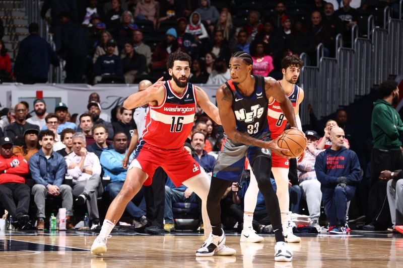 WASHINGTON, DC -? MARCH 27: Nicolas Claxton #33 of the Brooklyn Nets handles the ball during the game against the Washington Wizards on March 27, 2024 NBAE at Capital One Arena in Washington, DC. NOTE TO USER: User expressly acknowledges and agrees that, by downloading and or using this Photograph, user is consenting to the terms and conditions of the Getty Images License Agreement. Mandatory Copyright Notice: Copyright 2024 NBAE (Photo by Kenny Giarla/NBAE via Getty Images)