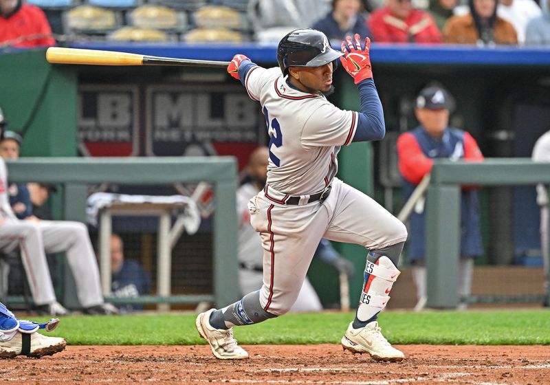 Apr 15, 2023; Kansas City, Missouri, USA;  Atlanta Braves second baseman Ozzie Albies (1) hits an RBI single during the third inning against the Kansas City Royals at Kauffman Stadium. Mandatory Credit: Peter Aiken-USA TODAY Sports