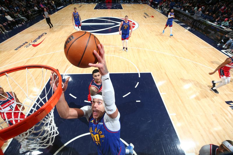 WASHINGTON, DC -? JANUARY 21:  Aaron Gordon #50 of the Denver Nuggets goes to the basket during the game on January 21, 2024 at Capital One Arena in Washington, DC. NOTE TO USER: User expressly acknowledges and agrees that, by downloading and or using this Photograph, user is consenting to the terms and conditions of the Getty Images License Agreement. Mandatory Copyright Notice: Copyright 2024 NBAE (Photo by Stephen Gosling/NBAE via Getty Images)