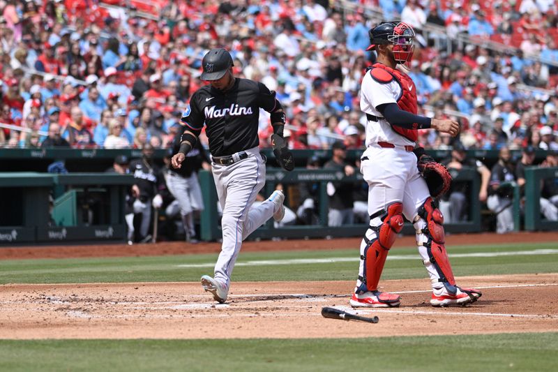 Apr 7, 2024; St. Louis, Missouri, USA; Miami Marlins second baseman Luis Arraez (3) scores a run against the St. Louis Cardinals during the second inning at Busch Stadium. Mandatory Credit: Jeff Le-USA TODAY Sports