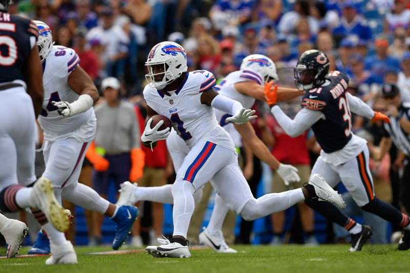 Buffalo Bills wide receiver Curtis Samuel (1) runs during the first half of an preseason NFL football game against the Chicago Bears, Saturday, Aug. 10, 2024, in Orchard Park, NY. (AP Photo/Adrian Kraus)