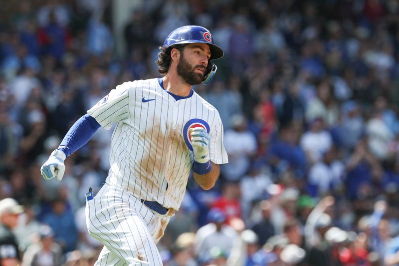 May 17, 2025; Chicago, Illinois, USA; Chicago Cubs shortstop Dansby Swanson (7) round the bases after hitting a solo home run against the Chicago White Sox during the fifth inning at Wrigley Field. Mandatory Credit: Kamil Krzaczynski-Imagn Images