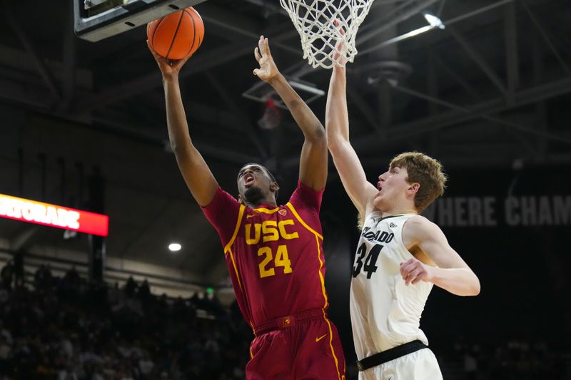 Feb 23, 2023; Boulder, Colorado, USA; USC Trojans forward Joshua Morgan (24) shoots the ball over Colorado Buffaloes center Lawson Lovering (34) in the second half at the CU Events Center. Mandatory Credit: Ron Chenoy-USA TODAY Sports