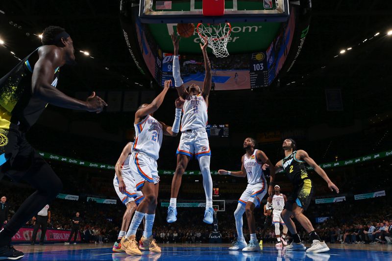 OKLAHOMA CITY, OK - MARCH 12: Shai Gilgeous-Alexander #2 of the Oklahoma City Thunder rebounds during the game against the Indiana Pacers on March 12, 2024 at Paycom Arena in Oklahoma City, Oklahoma. NOTE TO USER: User expressly acknowledges and agrees that, by downloading and or using this photograph, User is consenting to the terms and conditions of the Getty Images License Agreement. Mandatory Copyright Notice: Copyright 2024 NBAE (Photo by Zach Beeker/NBAE via Getty Images)