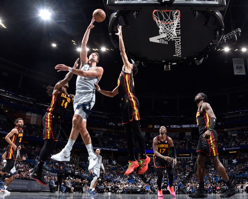 ORLANDO, FL - FEBRUARY 10: Franz Wagner #22 of the Orlando Magic drives to the basket during the game against the Atlanta Hawks on February 10, 2025 at Kia Center in Orlando, Florida. NOTE TO USER: User expressly acknowledges and agrees that, by downloading and or using this photograph, User is consenting to the terms and conditions of the Getty Images License Agreement. Mandatory Copyright Notice: Copyright 2025 NBAE (Photo by Fernando Medina/NBAE via Getty Images)