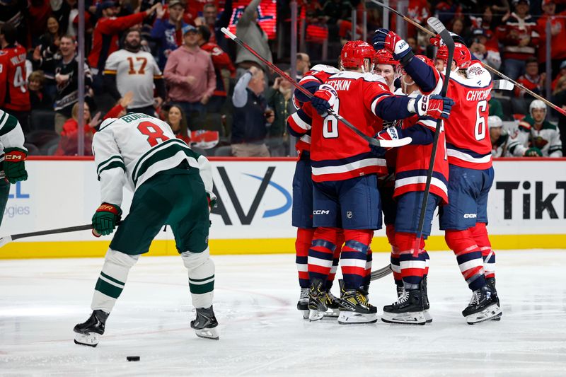 Oct 17, 2025; Washington, District of Columbia, USA; Washington Capitals left wing Alex Ovechkin (8) celebrates with teammates after scoring a goal against the Minnesota Wild during the third period at Capital One Arena. Mandatory Credit: Geoff Burke-Imagn Images