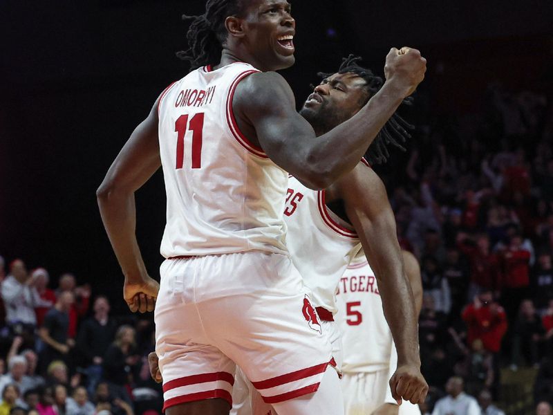 Jan 17, 2024; Piscataway, New Jersey, USA; Rutgers Scarlet Knights center Clifford Omoruyi (11) and guard Austin Williams (24) react during overtime against the Nebraska Cornhuskers  at Jersey Mike's Arena. Mandatory Credit: Vincent Carchietta-USA TODAY Sports