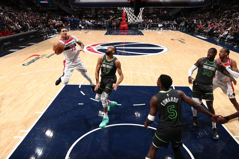 WASHINGTON, DC -?JANUARY 13:   Kyle Kuzma #33 of the Washington Wizards drives to the basket during the game against the Minnesota Timberwolves on January 13, 2025 at Capital One Arena in Washington, DC. NOTE TO USER: User expressly acknowledges and agrees that, by downloading and or using this Photograph, user is consenting to the terms and conditions of the Getty Images License Agreement. Mandatory Copyright Notice: Copyright 2024 NBAE (Photo by Kenny Giarla/NBAE via Getty Images)