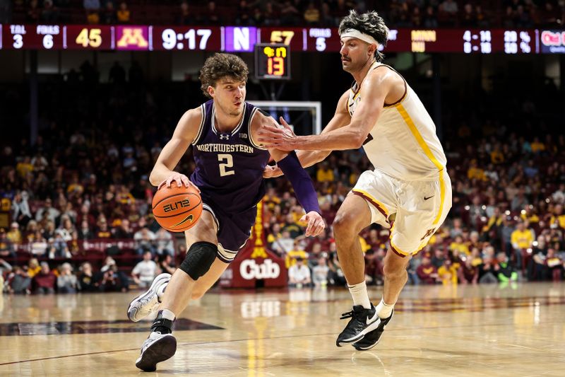 Feb 25, 2025; Minneapolis, Minnesota, USA; Northwestern Wildcats forward Nick Martinelli (2) works around Minnesota Golden Gophers forward Dawson Garcia (3) during the second half at Williams Arena. Mandatory Credit: Matt Krohn-Imagn Images