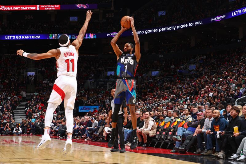 TORONTO, CANADA - MARCH 25: Mikal Bridges #1 of the Brooklyn Nets three point basket during the game against the Toronto Raptors on March 25, 2024 at the Scotiabank Arena in Toronto, Ontario, Canada.  NOTE TO USER: User expressly acknowledges and agrees that, by downloading and or using this Photograph, user is consenting to the terms and conditions of the Getty Images License Agreement.  Mandatory Copyright Notice: Copyright 2024 NBAE (Photo by Vaughn Ridley/NBAE via Getty Images)