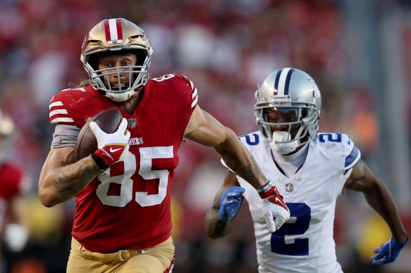 San Francisco 49ers tight end George Kittle (85) runs for a TD during an NFL football game against the Dallas Cowboys, Sunday, Oct 8, 2023, in Santa Clara, Calif. (AP Photo/Scot Tucker)