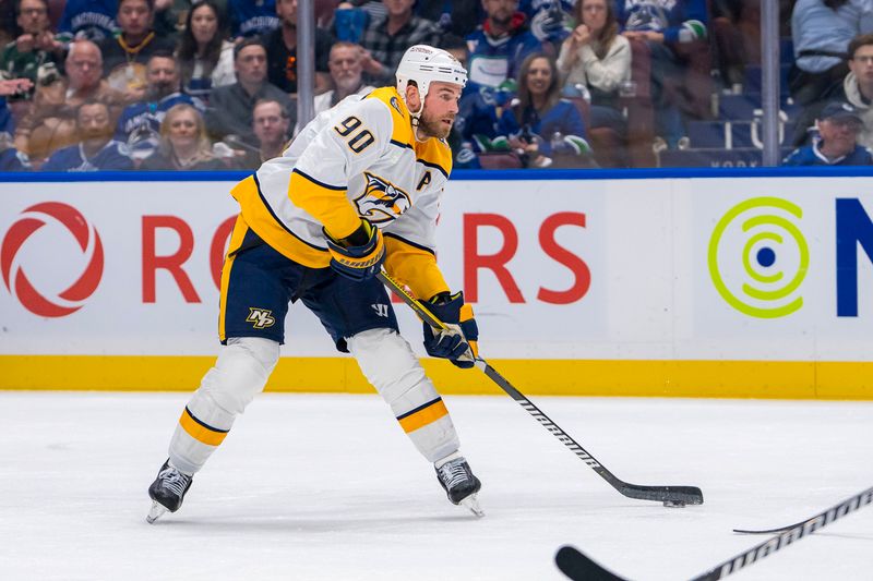 Apr 30, 2024; Vancouver, British Columbia, CAN; Nashville Predators forward Ryan O'Reilly (90) handles the puck against the Vancouver Canucks during the second period in game five of the first round of the 2024 Stanley Cup Playoffs at Rogers Arena. Mandatory Credit: Bob Frid-USA TODAY Sports