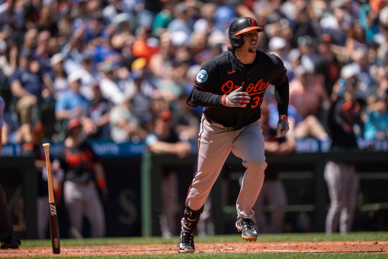Jun 5, 2025; Seattle, Washington, USA;  Balitimore Orioles designated hitter Adley Rutschman (35) rounds the bases after hitting a two-run home run during the sixth inning against the Seattle Mariners at T-Mobile Park. Mandatory Credit: Stephen Brashear-Imagn Images