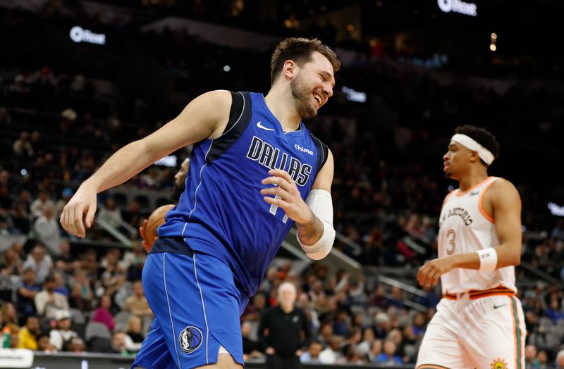 SAN ANTONIO, TX - MARCH 19:  Luka Doncic #77 of the Dallas Mavericks is all smiles after scoring on the San Antonio Spurs in the second half at Frost Bank Center on March 19, 2024 in San Antonio, Texas. NOTE TO USER: User expressly acknowledges and agrees that, by downloading and or using this photograph, User is consenting to terms and conditions of the Getty Images License Agreement. (Photo by Ronald Cortes/Getty Images)