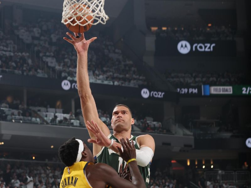 MILWAUKEE, WI - APRIL 23: Brook Lopez #11 of the Milwaukee Bucks shoots the ball during the game against the Indiana Pacers during Round One Game Two of the 2024 NBA Playoffs on April 23, 2024 at the Fiserv Forum Center in Milwaukee, Wisconsin. NOTE TO USER: User expressly acknowledges and agrees that, by downloading and or using this Photograph, user is consenting to the terms and conditions of the Getty Images License Agreement. Mandatory Copyright Notice: Copyright 2024 NBAE (Photo by Gary Dineen/NBAE via Getty Images).