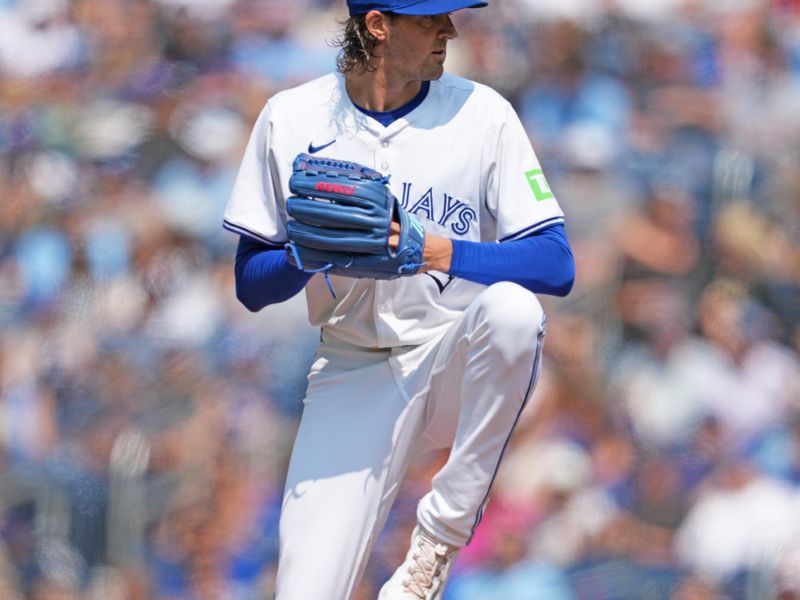 Jul 27, 2024; Toronto, Ontario, CAN; Toronto Blue Jays starting pitcher Kevin Gausman (34) throws a pitch against the Texas Rangers during the first inning at Rogers Centre. Mandatory Credit: Nick Turchiaro-USA TODAY Sports