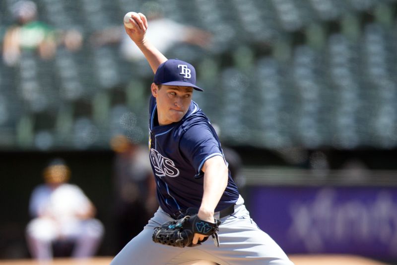 Aug 22, 2024; Oakland, California, USA; Tampa Bay Rays pitcher Kevin Kelly (49) delivers a pitch against the Oakland Athletics during the fifth inning at Oakland-Alameda County Coliseum. Mandatory Credit: D. Ross Cameron-USA TODAY Sports