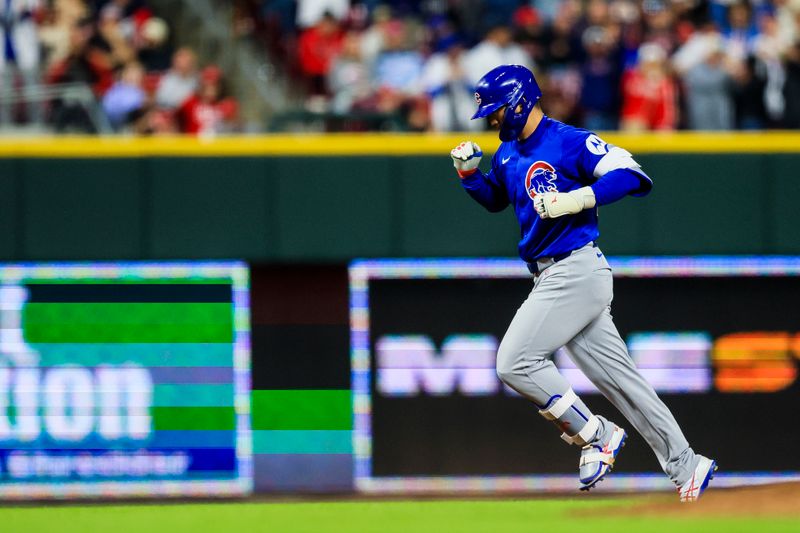 May 23, 2025; Cincinnati, Ohio, USA; Chicago Cubs outfielder Seiya Suzuki (27) runs the bases after hitting a three-run home run in the eighth inning against the Cincinnati Reds at Great American Ball Park. Mandatory Credit: Katie Stratman-Imagn Images