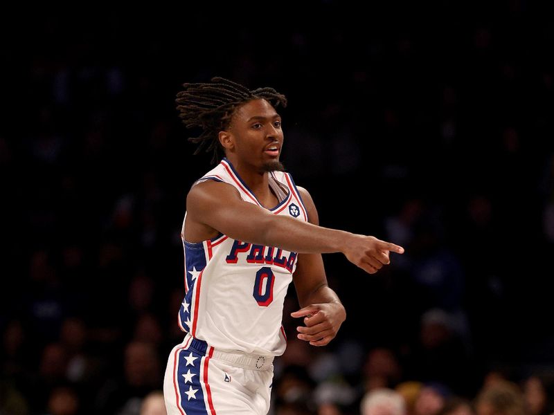 NEW YORK, NEW YORK - NOVEMBER 19:  Tyrese Maxey #0 of the Philadelphia 76ers directs his teammates in the second half against the Brooklyn Nets at Barclays Center on November 19, 2023 in the Brooklyn borough of New York City. The Philadelphia 76ers defeated the Brooklyn Nets 121-99. NOTE TO USER: User expressly acknowledges and agrees that, by downloading and or using this photograph, User is consenting to the terms and conditions of the Getty Images License Agreement. (Photo by Elsa/Getty Images)