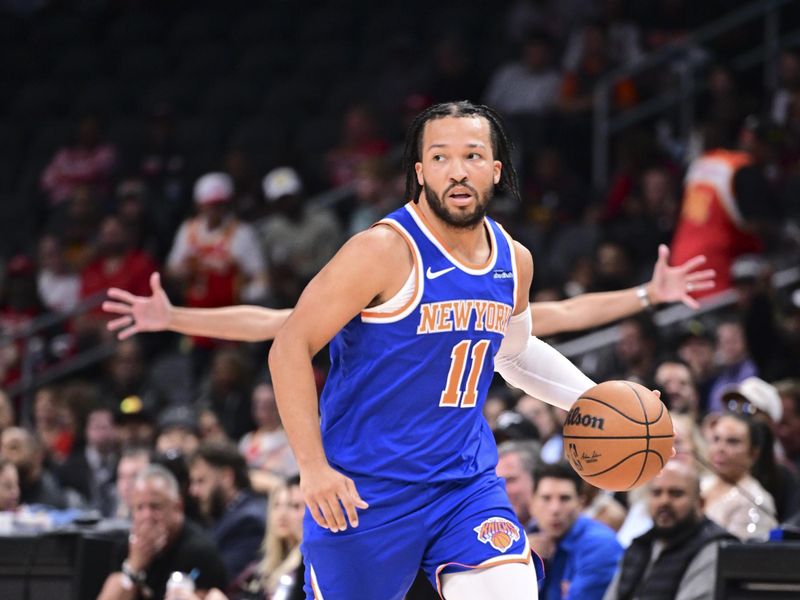 ATLANTA, GA - November 6:  Jalen Brunson #11 of the New York Knicks dribbles the ball during the game against the Atlanta Hawks on November 6, 2024 at State Farm Arena in Atlanta, Georgia.  NOTE TO USER: User expressly acknowledges and agrees that, by downloading and/or using this Photograph, user is consenting to the terms and conditions of the Getty Images License Agreement. Mandatory Copyright Notice: Copyright 2024 NBAE (Photo by Adam Hagy/NBAE via Getty Images)