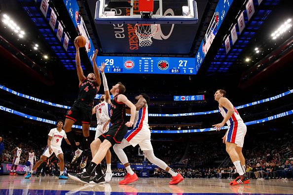 DETROIT, MI - DECEMBER 30: Scottie Barnes #4 of the Toronto Raptors drives to the basket during the game against the Detroit Pistons on December 30, 2023 at Little Caesars Arena in Detroit, Michigan. NOTE TO USER: User expressly acknowledges and agrees that, by downloading and/or using this photograph, User is consenting to the terms and conditions of the Getty Images License Agreement. Mandatory Copyright Notice: Copyright 2023 NBAE (Photo by Brian Sevald/NBAE via Getty Images)