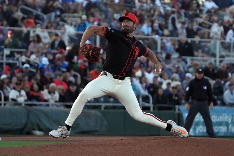 Mar 18, 2025; Scottsdale, Arizona, USA; San Francisco Giants pitcher Robbie Ray (38) throws against the San Diego Padres in the first inning at Scottsdale Stadium. Mandatory Credit: Rick Scuteri-Imagn Images