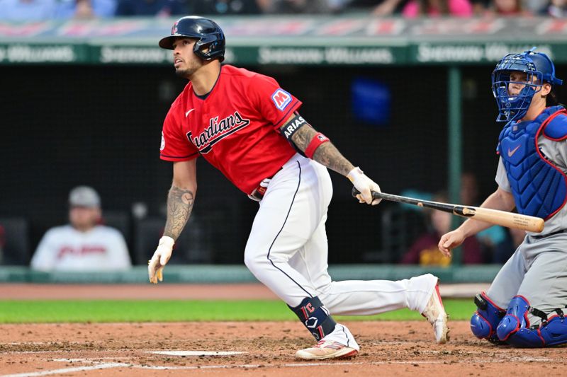 Aug 22, 2023; Cleveland, Ohio, USA; Cleveland Guardians shortstop Gabriel Arias (13) hits an RBI single during the fourth inning against the Los Angeles Dodgers at Progressive Field. Mandatory Credit: Ken Blaze-USA TODAY Sports