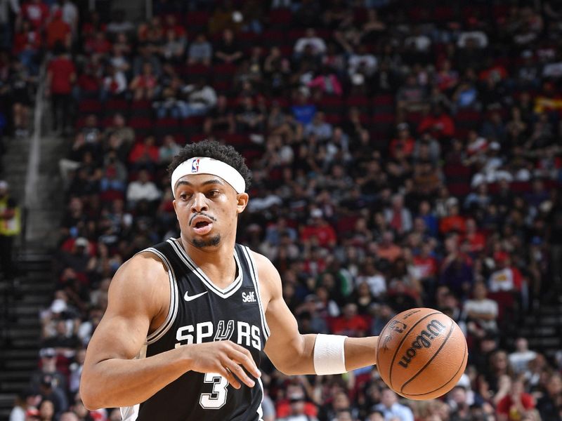 HOUSTON, TX - MARCH 5: Keldon Johnson #3 of the San Antonio Spurs dribbles the ball during the game against the Houston Rockets  on March 5, 2024 at the Toyota Center in Houston, Texas. NOTE TO USER: User expressly acknowledges and agrees that, by downloading and or using this photograph, User is consenting to the terms and conditions of the Getty Images License Agreement. Mandatory Copyright Notice: Copyright 2024 NBAE (Photo by Logan Riely/NBAE via Getty Images)