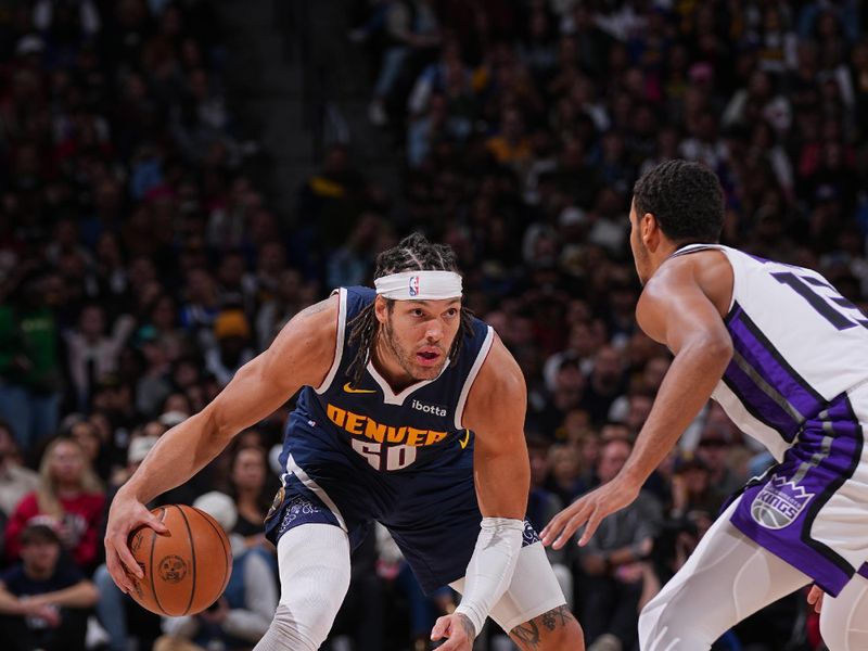 DENVER, CO - FEBRUARY 14: Aaron Gordon #50 of the Denver Nuggets dribbles the ball during the game against the Sacramento Kings on February 14, 2024 at the Ball Arena in Denver, Colorado. NOTE TO USER: User expressly acknowledges and agrees that, by downloading and/or using this Photograph, user is consenting to the terms and conditions of the Getty Images License Agreement. Mandatory Copyright Notice: Copyright 2024 NBAE (Photo by Bart Young/NBAE via Getty Images)