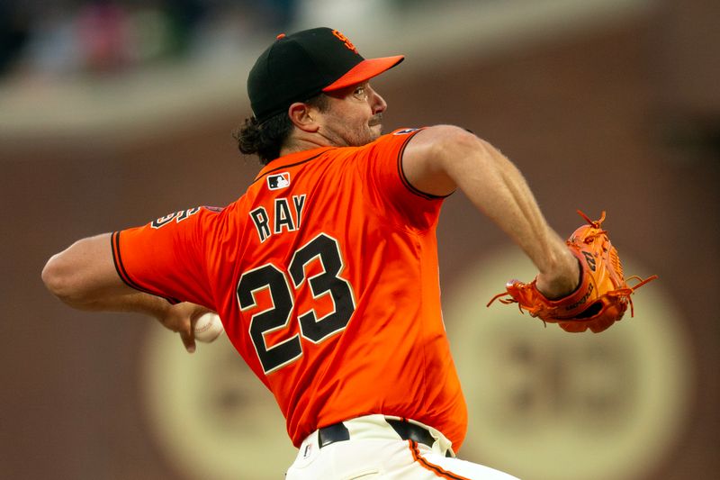Aug 9, 2024; San Francisco, California, USA; San Francisco Giants starting pitcher Robbie Ray (23) delivers a pitch against the Detroit Tigers during the second inning at Oracle Park. Mandatory Credit: D. Ross Cameron-USA TODAY Sports