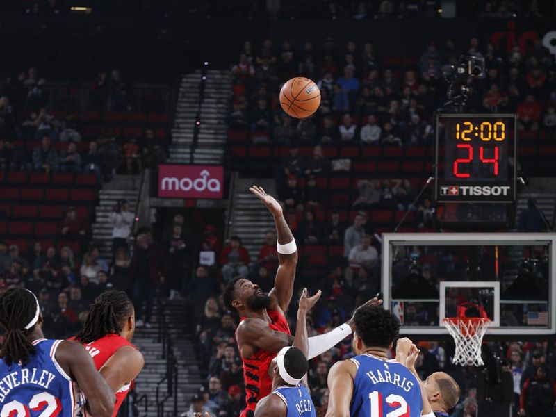 PORTLAND, OR - JANUARY 29: Deandre Ayton #2 of the Portland Trail Blazers and Paul Reed #44 of the Philadelphia 76ers go up for the opening tip off on January 29, 2024 at the Moda Center Arena in Portland, Oregon. NOTE TO USER: User expressly acknowledges and agrees that, by downloading and or using this photograph, user is consenting to the terms and conditions of the Getty Images License Agreement. Mandatory Copyright Notice: Copyright 2024 NBAE (Photo by Cameron Browne/NBAE via Getty Images)