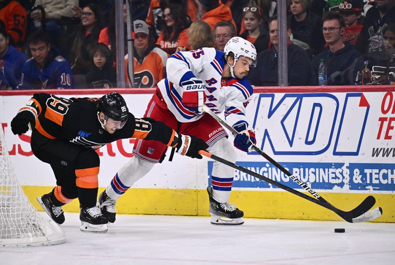 Nov 24, 2023; Philadelphia, Pennsylvania, USA; Philadelphia Flyers right wing Cam Atkinson (89) reaches against New York Rangers defenseman Ryan Lindgren (55) in the second period at Wells Fargo Center. Mandatory Credit: Kyle Ross-USA TODAY Sports