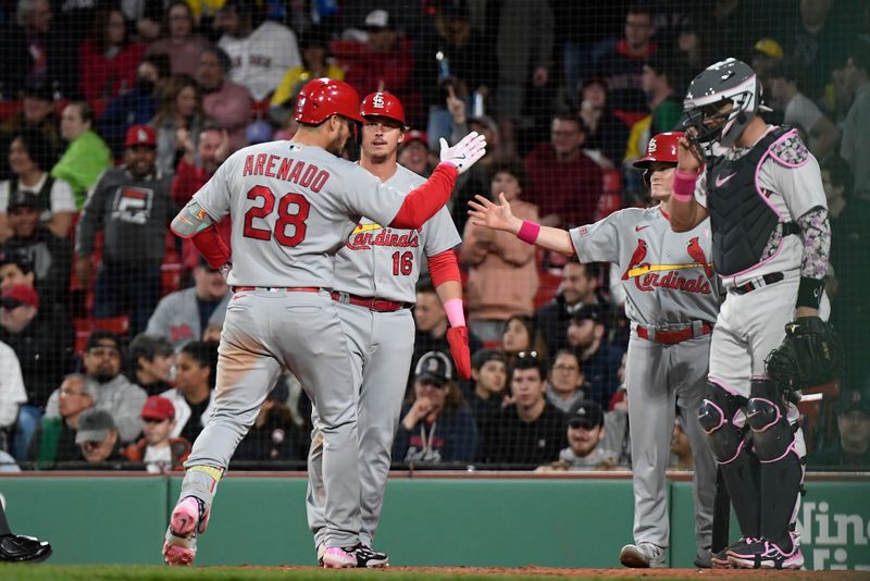 May 14, 2023; Boston, Massachusetts, USA; St. Louis Cardinals third baseman Nolan Arenado (28) celebrates a two run home run against the Boston Red Sox during the eighth inning at Fenway Park. Mandatory Credit: Eric Canha-USA TODAY Sports