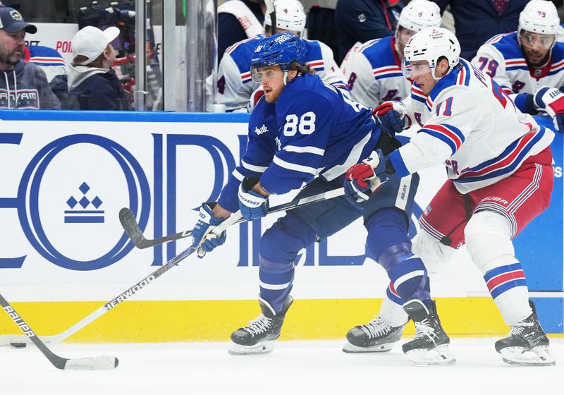 Dec 19, 2023; Toronto, Ontario, CAN; Toronto Maple Leafs right wing William Nylander (88) battles for the puck with New York Rangers center Tyler Pitlick (71) during the third period at Scotiabank Arena. Mandatory Credit: Nick Turchiaro-USA TODAY Sports