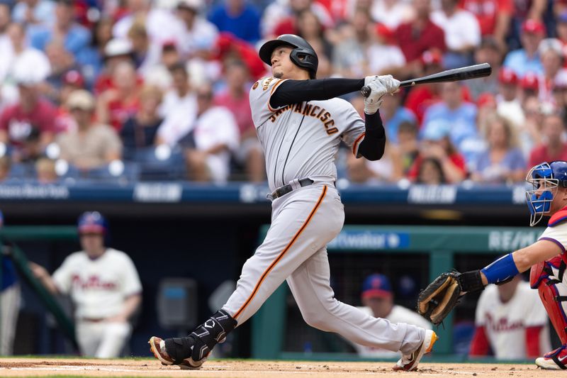 Aug 23, 2023; Philadelphia, Pennsylvania, USA; San Francisco Giants first baseman Wilmer Flores (41) hits a home run during the first inning against the Philadelphia Phillies at Citizens Bank Park. Mandatory Credit: Bill Streicher-USA TODAY Sports